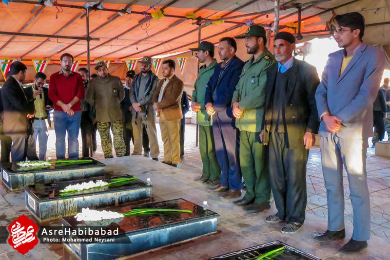 غبار روبی و عطر افشانی قبور شهدای روستای علی آباد ملاعلی